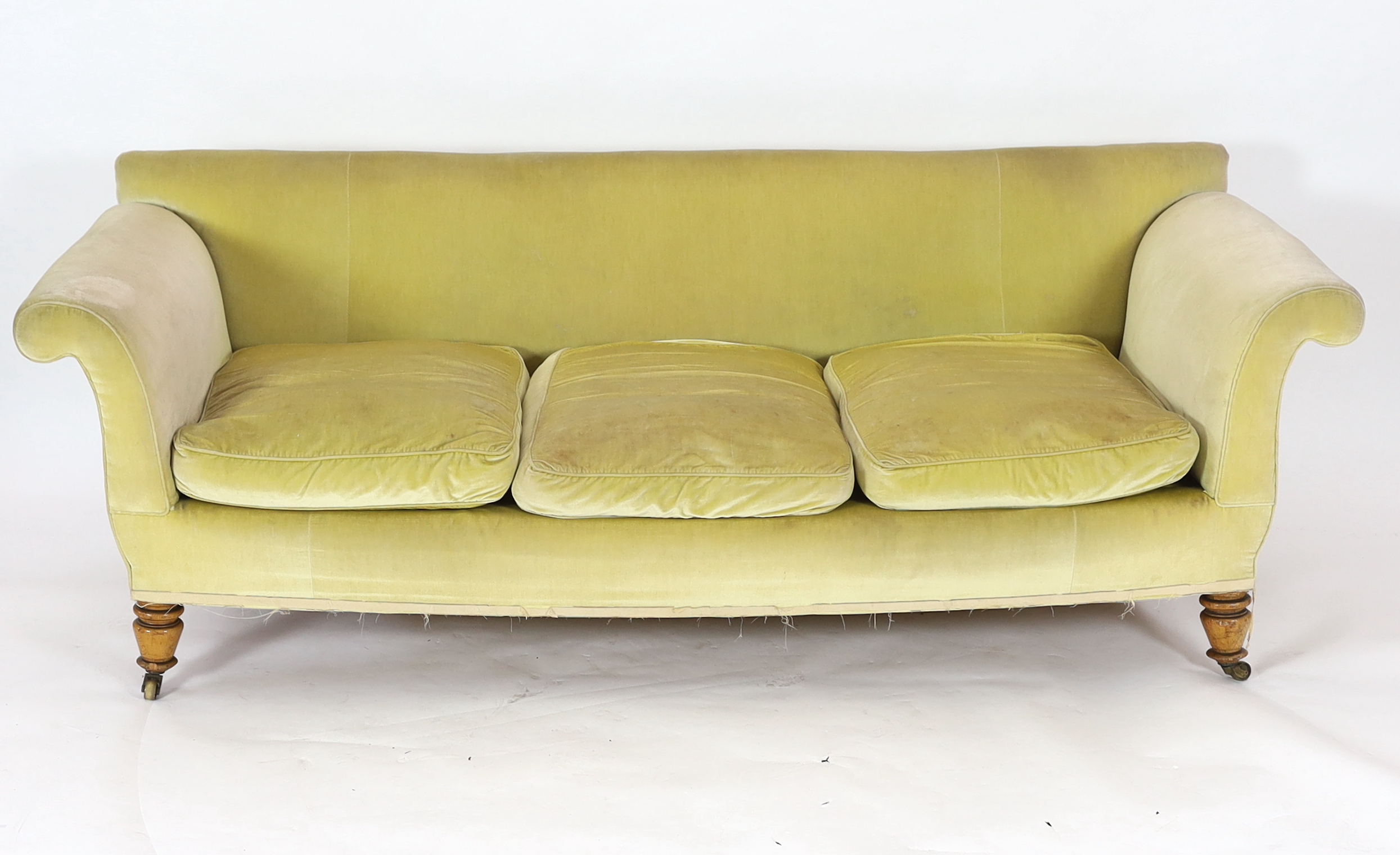 A large Victorian style sofa in the manner of Howard & Sons, 240cm wide, 92cm deep, 85cm high